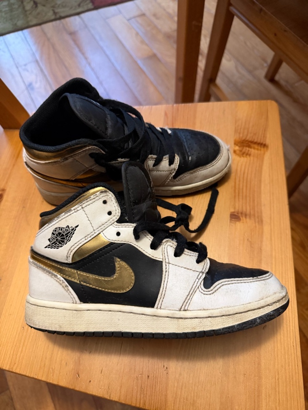 Boys Nike Black White Gold Jordan 1 Mid Sneakers